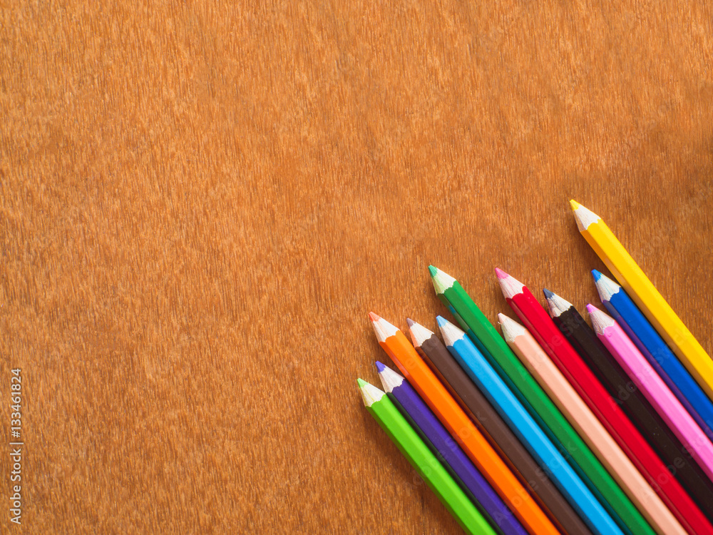 Set of color pencils on wood table. Set of color pencils on wood table.