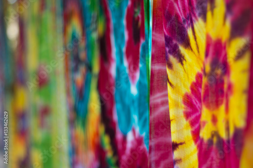 Multi-colored Batik fabric. Tie dye fabric. dry clothes in the sun