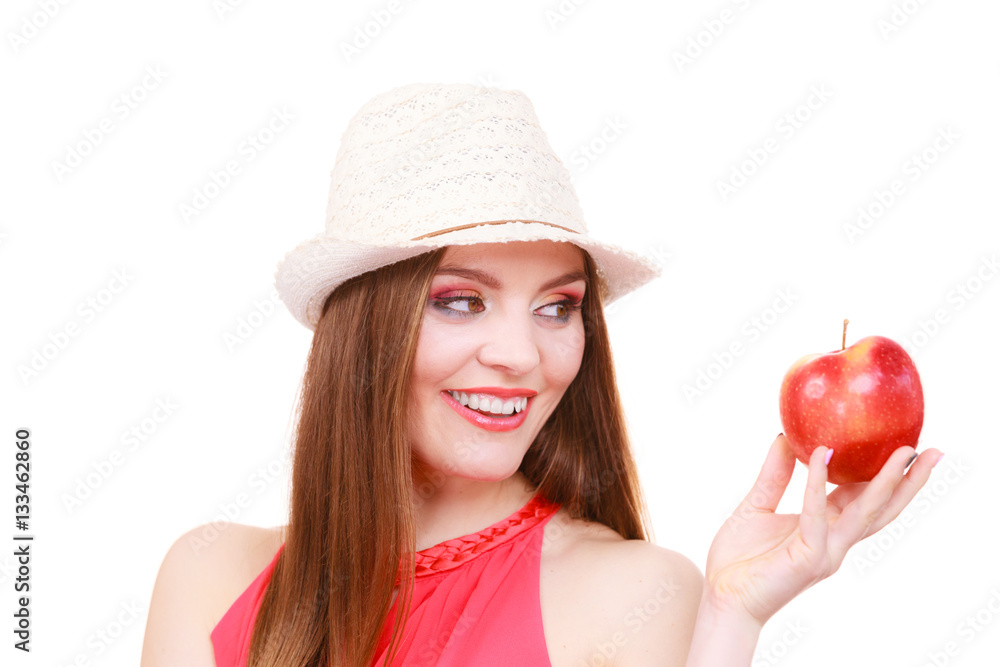 Woman summer hat colorful makeup holds apple fruit Woman summer hat colorful makeup holds apple fruit