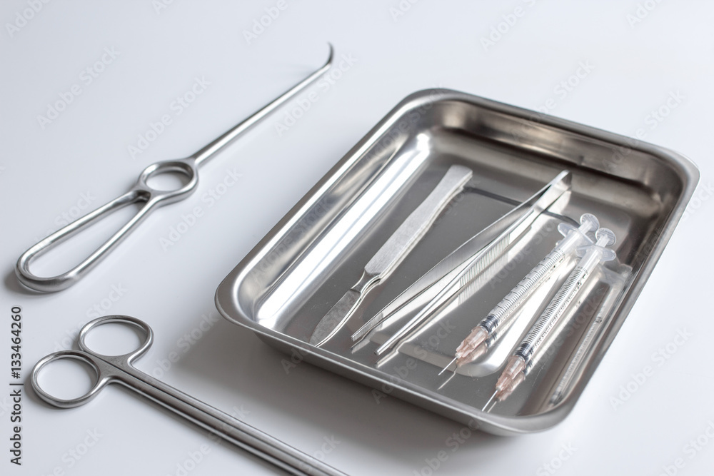instruments for plastic surgery on white background instruments for plastic surgery on white background