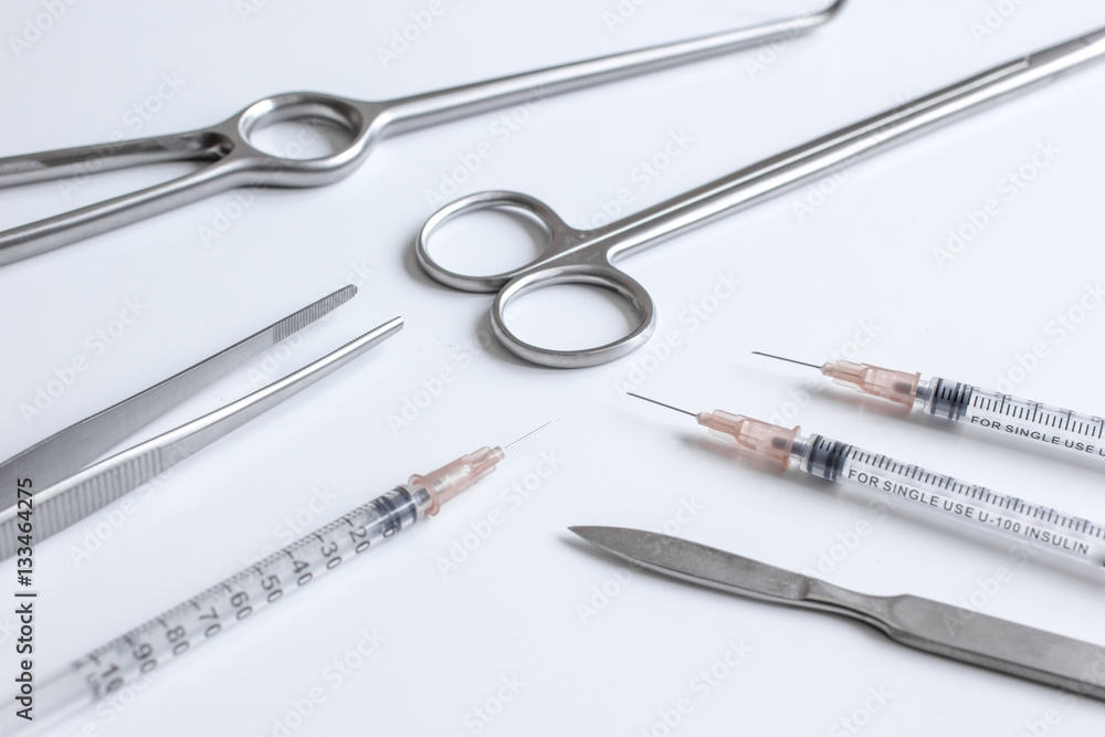 instruments for plastic surgery on white background instruments for plastic surgery on white background