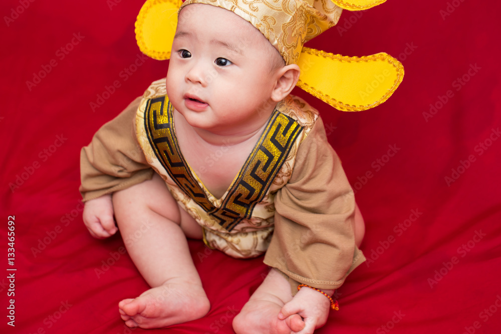 Asian baby in costume king of china cosplay Asian baby in costume king of china cosplay