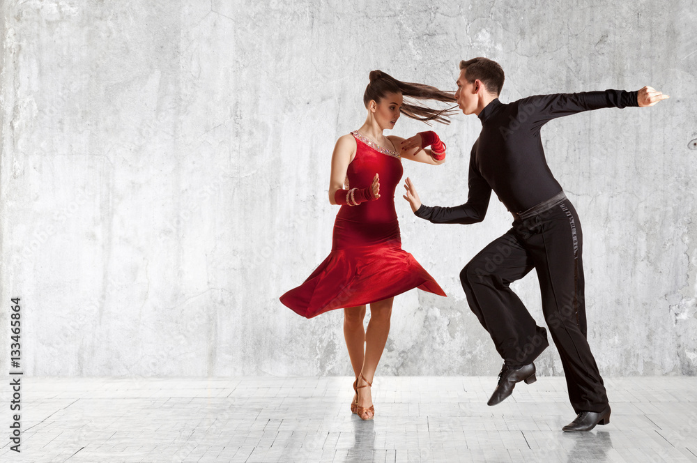 Beautiful couple in the active ballroom dance on wall - obrazy, fototapety, plakaty 