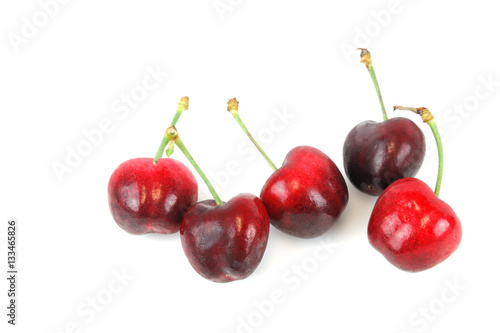 close up on fresh cherries isolated on white background