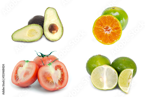 Avocado, orange, tomato and lemon (lime) fruit isolated on white