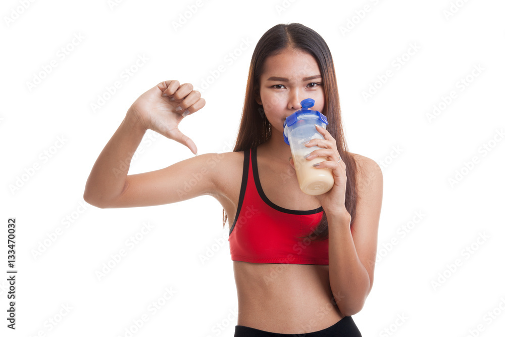 Beautiful Asian healthy girl thumbs down hate whey protein. Beautiful Asian healthy girl thumbs down hate whey protein.