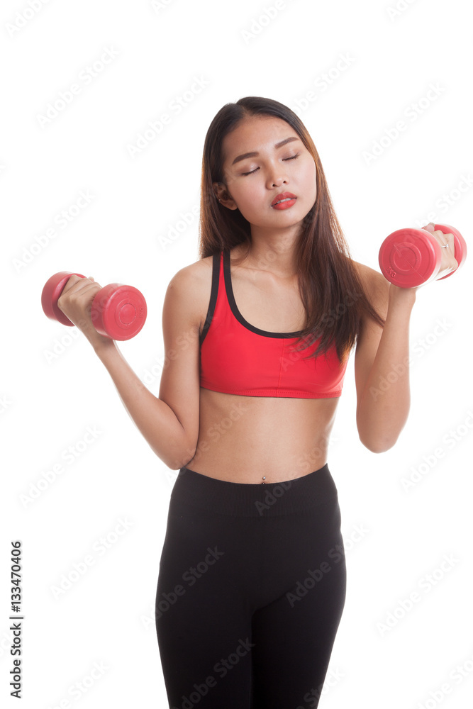 Tired Asian healthy girl exercise with dumbbell. Tired Asian healthy girl exercise with dumbbell.