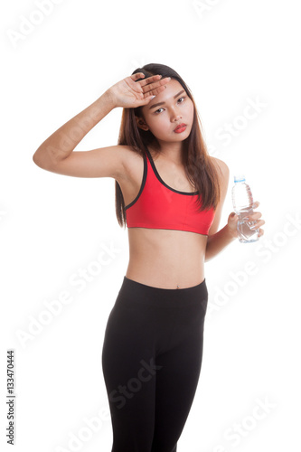Beautiful Asian healthy girl with bottle of drinking water.
