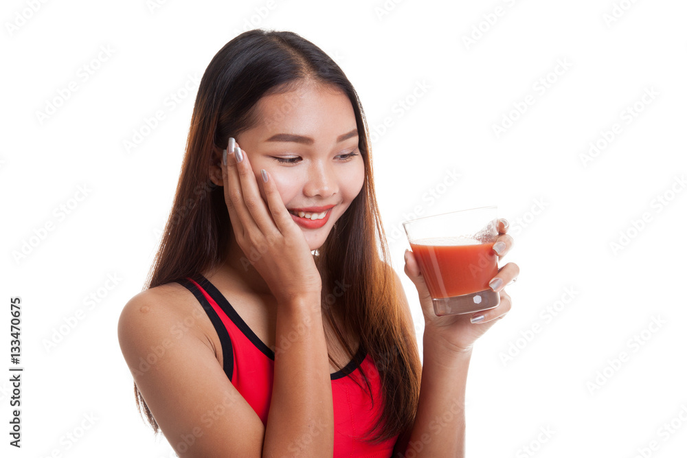 Beautiful healthy Asian girl like tomato juice. Beautiful healthy Asian girl like tomato juice.