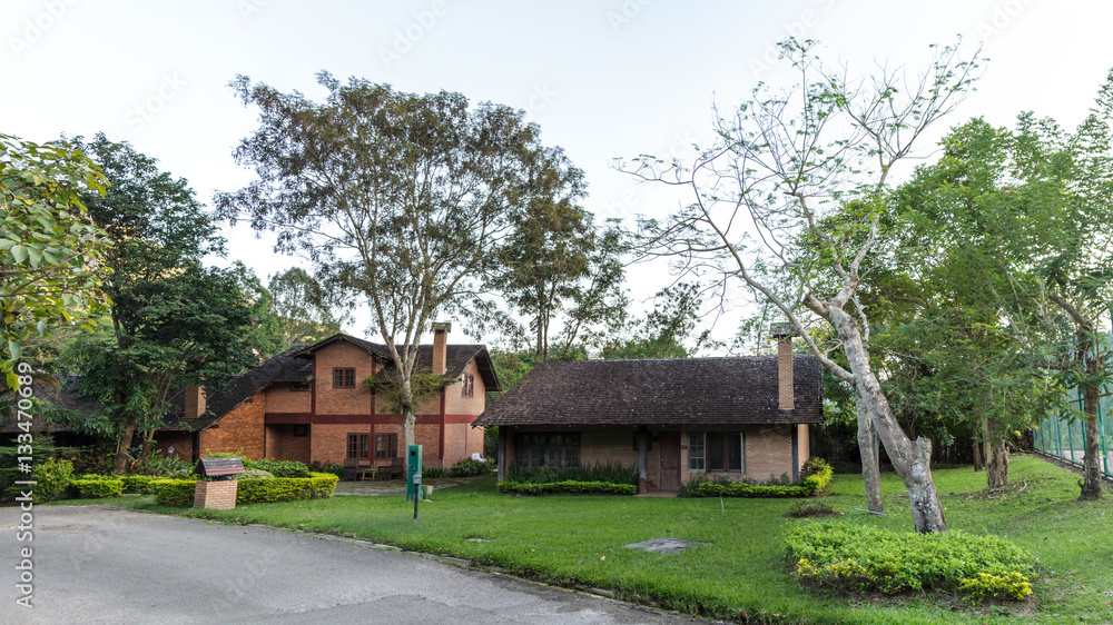 House build brick and wood in countryside. House build brick and wood in countryside.