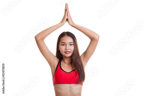 Beautiful Asian healthy girl do yoga pose.