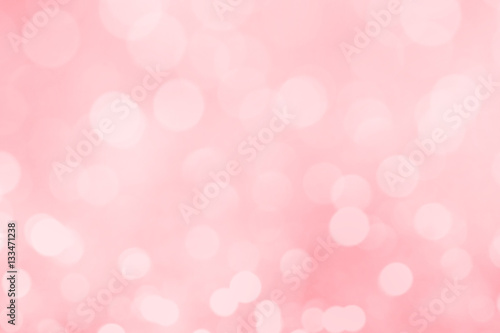 Abstract blurred pink bokeh lights background.