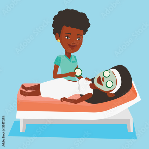 Cosmetologist making beauty treatments to woman.