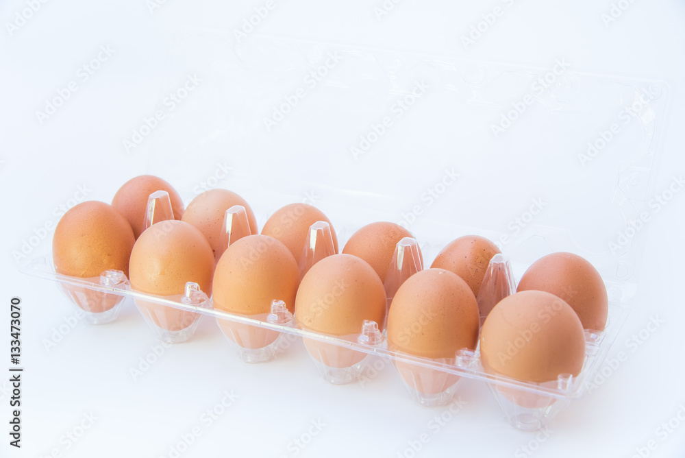 Chicken eggs in a plastic pack.
