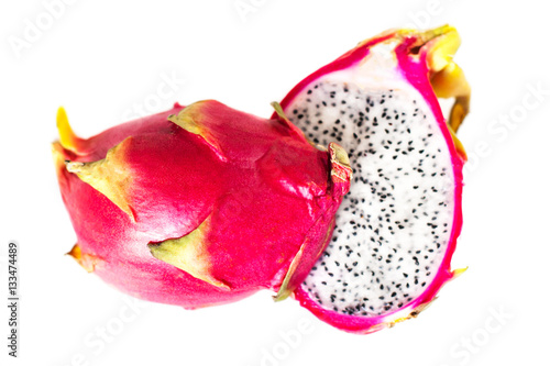 Dragon fruit cut in a half isolated on white background macro..