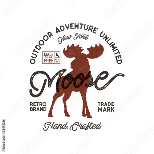 Outdoor adventure label. Vintage typography with moose and texts. Retro illustration of outdoor adventure. Vector wilderness logo with letterpress effect. Custom explorer quote.