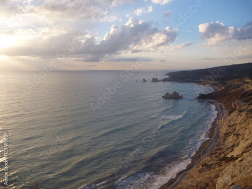 beautiful romantic sunset at a rocky seashore