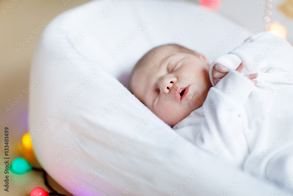 Portrait of cute adorable newborn baby girl sleeping