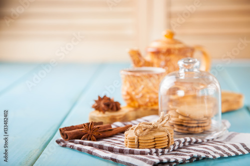 cookies with cinnamon and tea on a table, selective focus, copy space