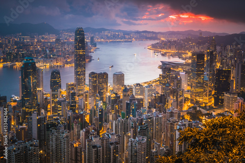 Sunrise over Victoria Harbor as viewed atop Victoria Peak with Hong kong and Kowloon below