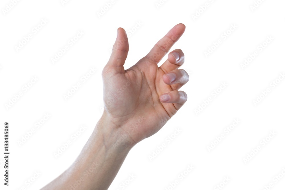 Hand of man pretending to touch an invisible screen Hand of man pretending to touch an invisible screen