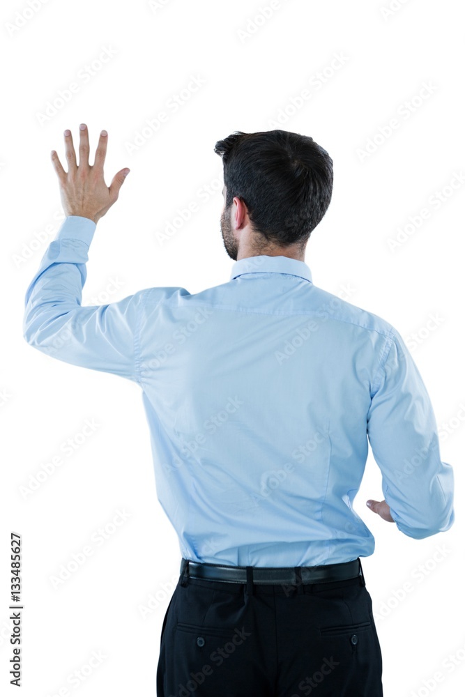 Businessman pretending to touch an invisible screen Businessman pretending to touch an invisible screen