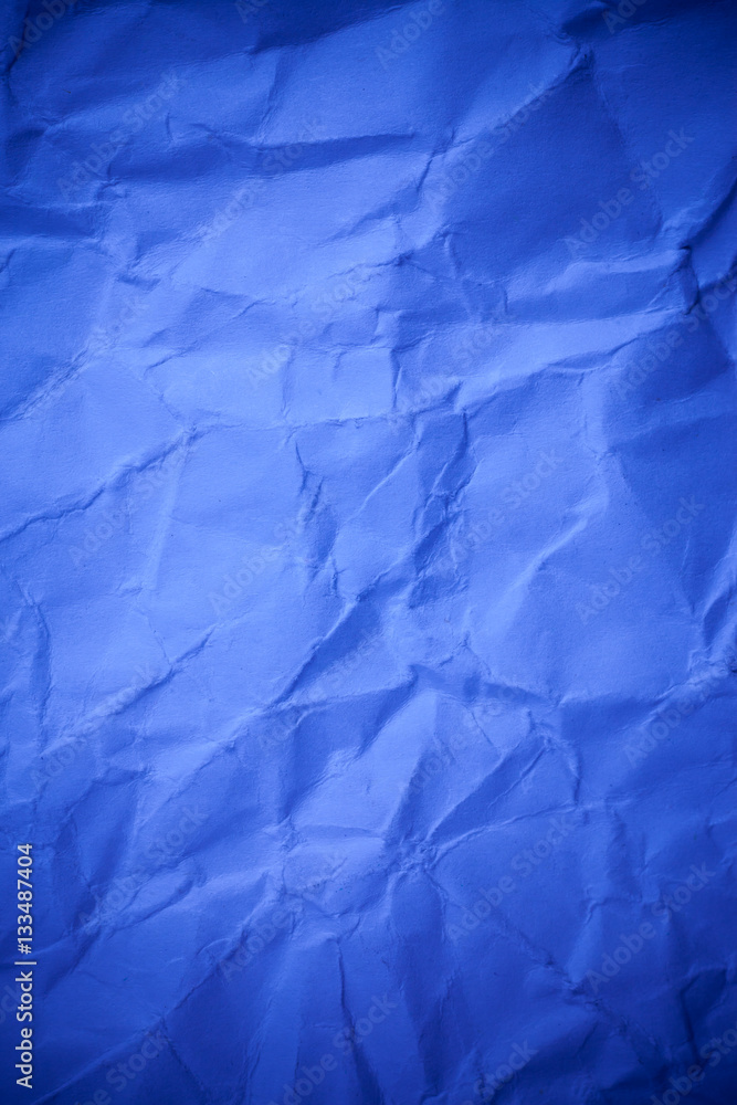 Obraz premium Blue crumpled paper texture background.