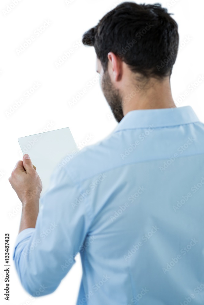 Rear view of man holding futuristic digital tablet Rear view of man holding futuristic digital tablet