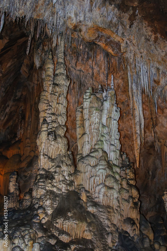 Stalactites and stalagmites in Les Grandes Canalettes grotto in French Pyrenees