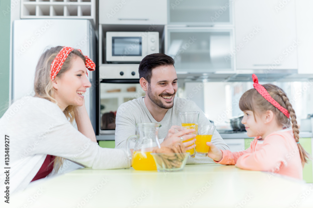 Family having breakfast in kitchen Family having breakfast in kitchen