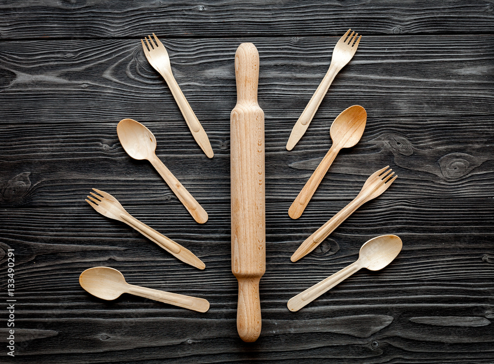 wooden kitchen utensils on dark background top view pattern wooden kitchen utensils on dark background top view pattern