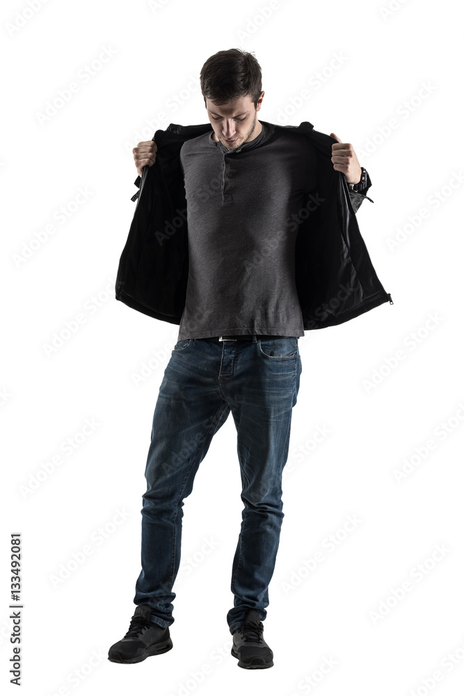 Silhouette back lit casual man taking off jacket looking down. Full body  length portrait isolated over white background. Stock Photo | Adobe Stock