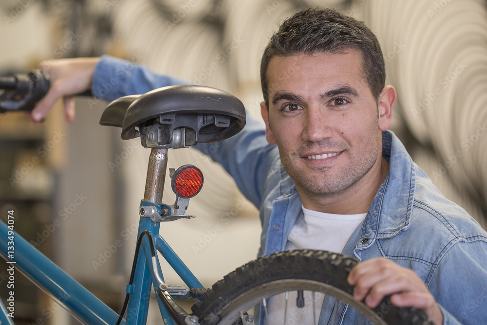 Portrait of bicycle mechanic Stock Photo Adobe Stock