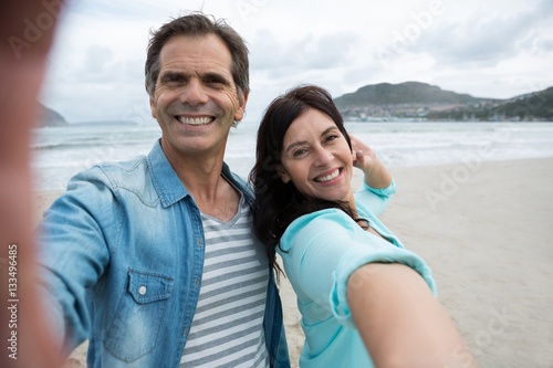 Portrait of couple enjoying on beach © WavebreakmediaMicro