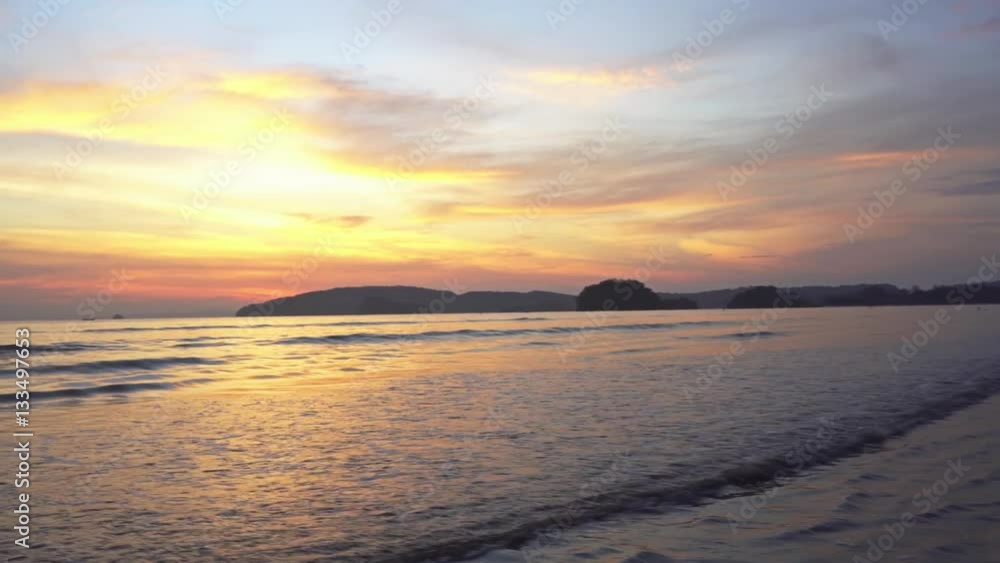 Colorful sunset on the beach of Ao Nang, Krabi, Thailand. Colored reflections in the water and deserted beach-1
Colorful sunset on the beach of Ao Nang, Krabi, Thailand. Colored reflections in the water and deserted beach-1