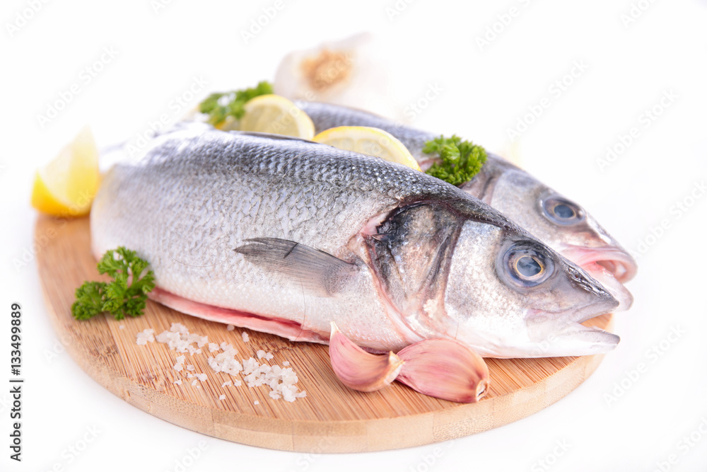 raw fish on board isolated on white