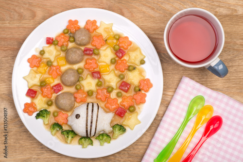 Meatballs with vegetables with rice, cute meal for a child