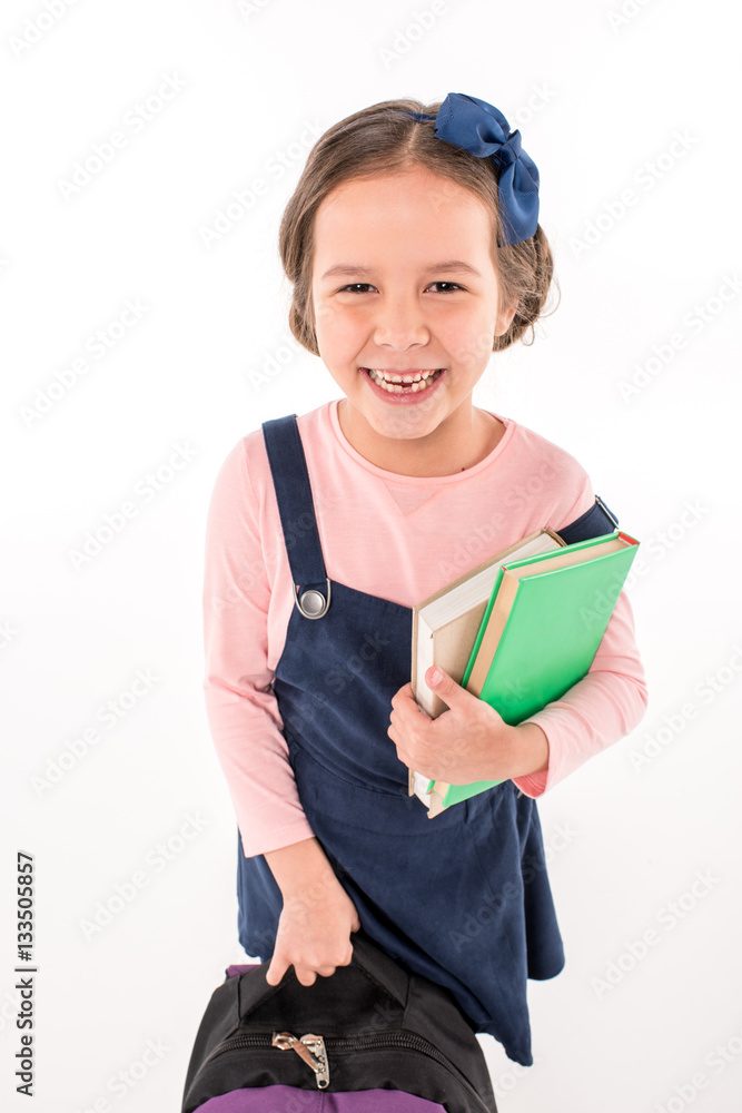 Schoolgirl holding books Schoolgirl holding books