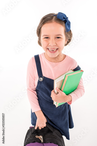 Schoolgirl holding books