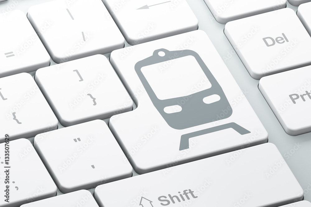 Travel concept: Train on computer keyboard background Travel concept: Train on computer keyboard background