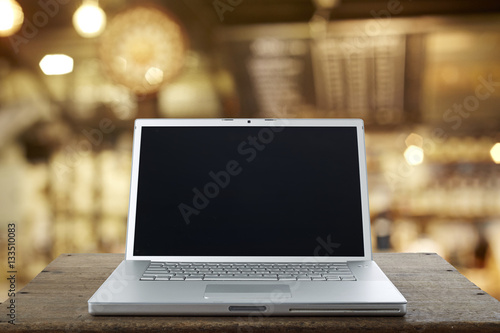 Aluminum Laptop on a wooden table