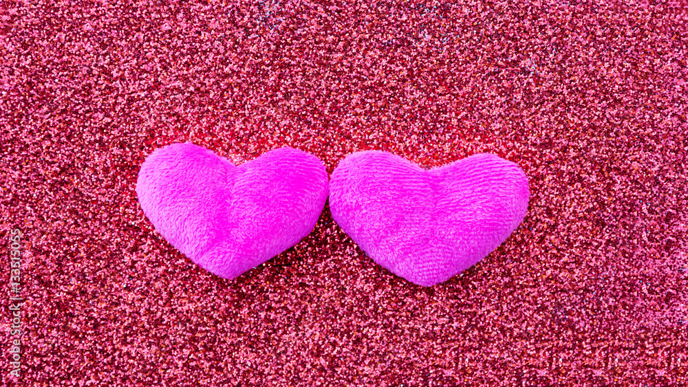 Obraz premium heart on a pink glitter abstracts for a background.