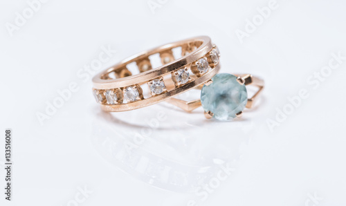 Gold ring with light Topaz and a thick ring with diamonds