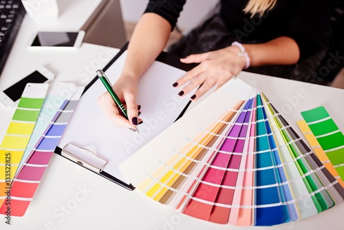 Woman designer or architect choosing color