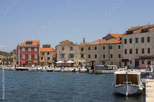 Houses near the sea in port of Stari Grad on adriatic island Hvar in Croatia, Europe