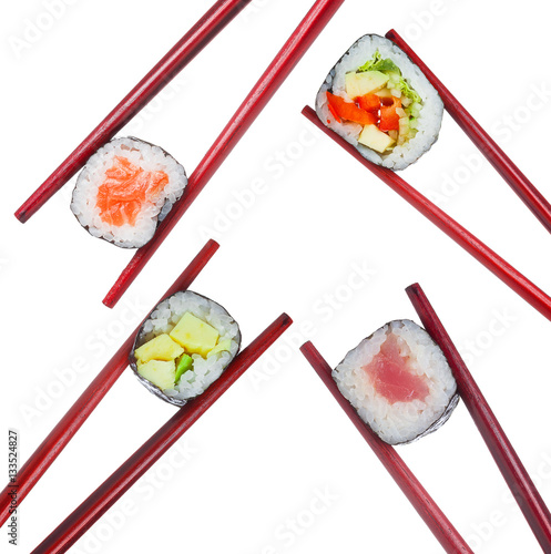 Sushi roll set in wooden red chopsticks isolated on white background
