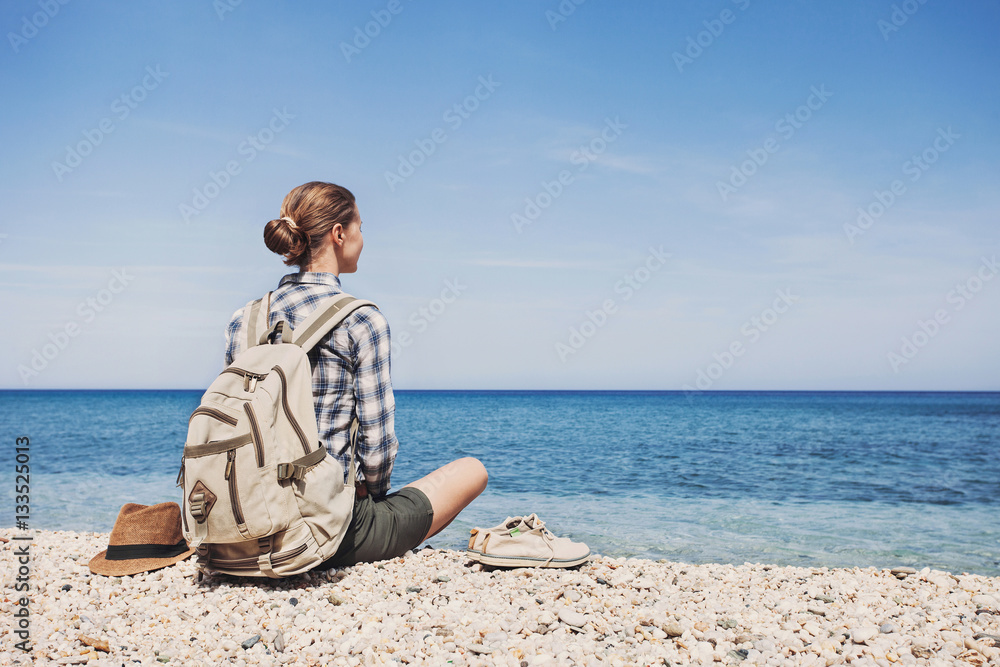 Young woman enjoying nature, travel and active lifestyle concept