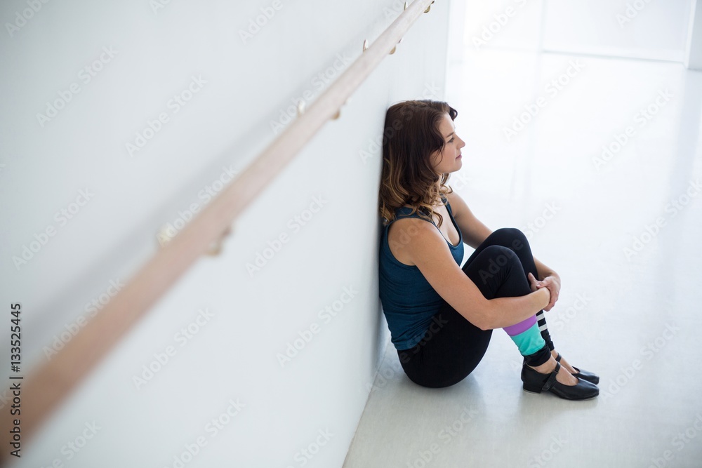 Dancer relaxing on floor Dancer relaxing on floor