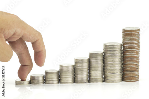 finger walking on pile of coins, concept in growth, finance, account and success in business step by step