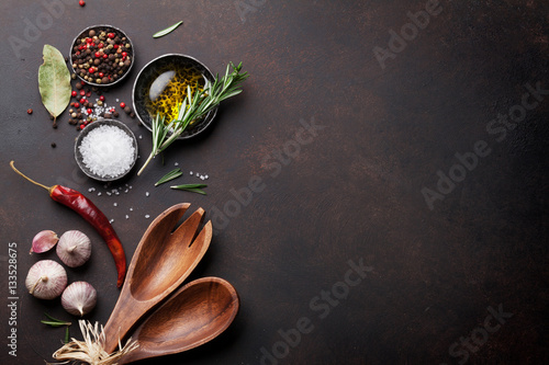 Cooking table with herbs, spices and utensils